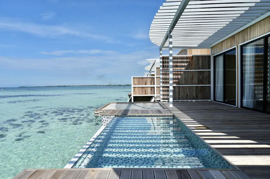 Private oceanview deck featuring a plunge pool and direct sea access at F-Lina Water Villa Resort. A beautiful Semporna getaway equipped for barefoot luxury and snorkeling.